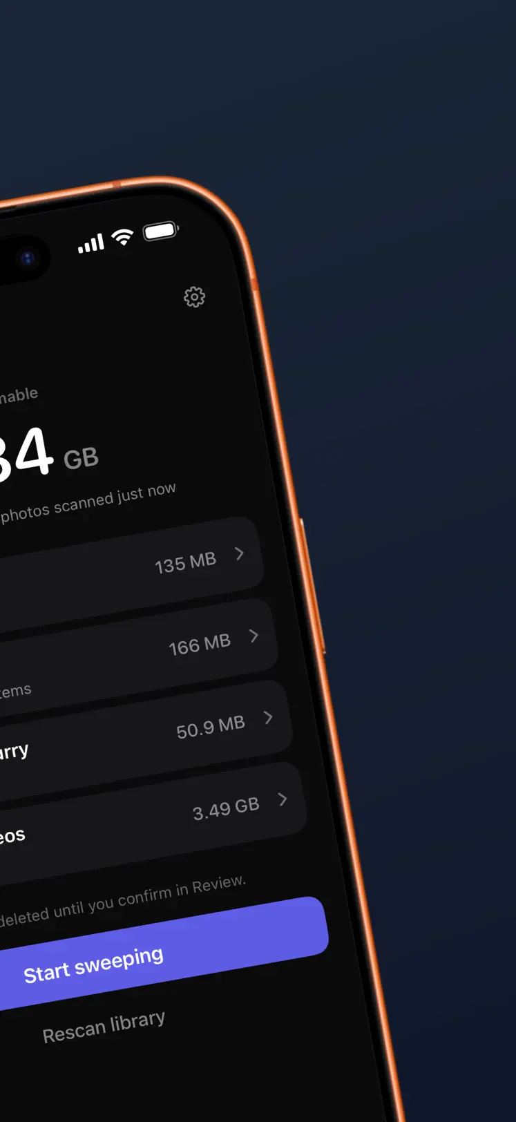 Sweep categories: duplicates, screenshots, possibly blurry photos and large videos